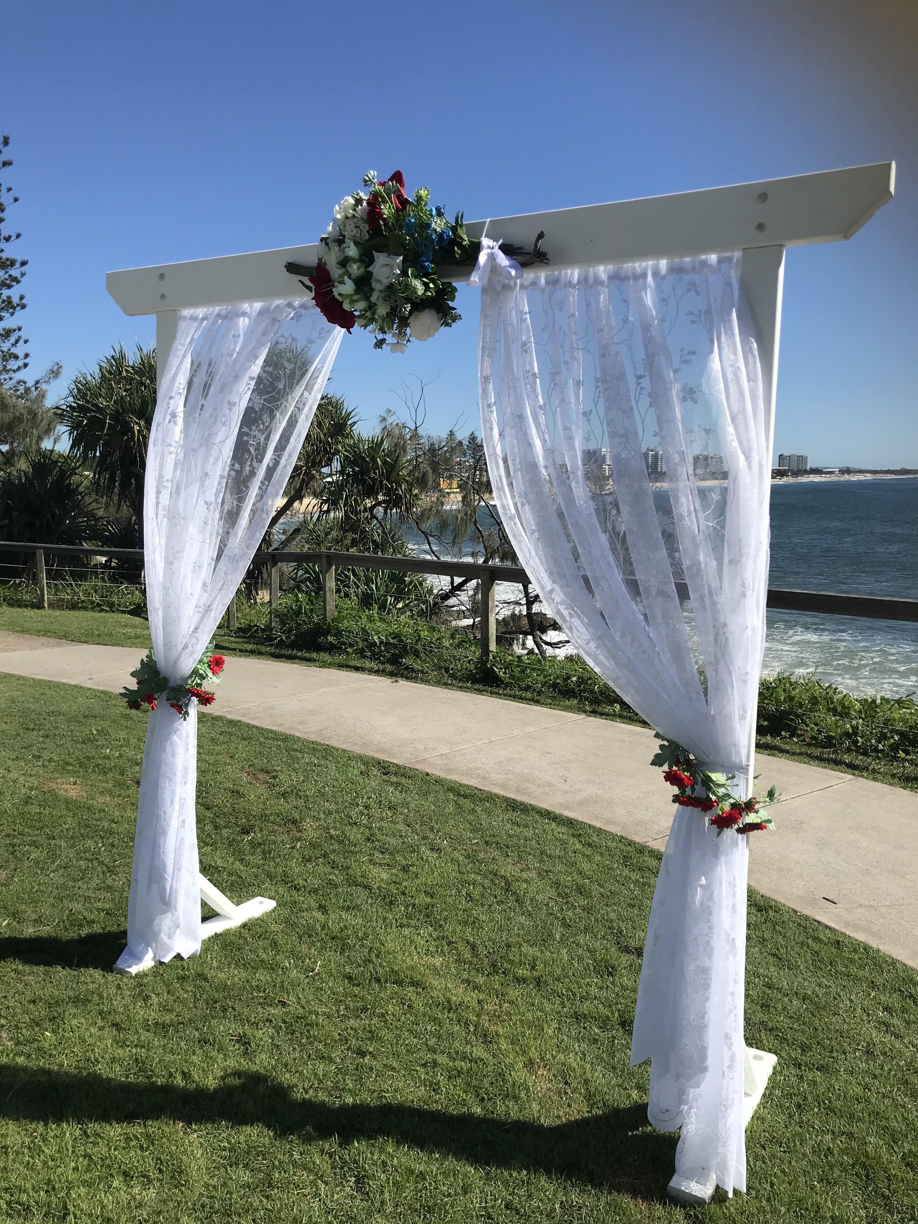 white wood wedding arbor optional cloth curtain opening style with optional faux flower sets.